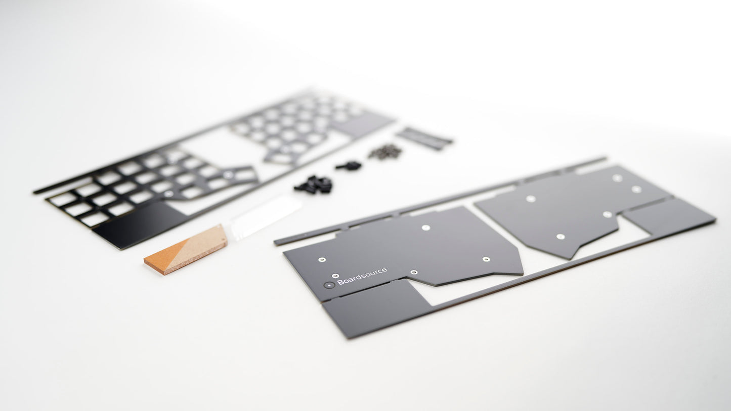 View of Corne FR4 Case DIY Kit with showcasing the matte black FR4 backplate and switchplate.