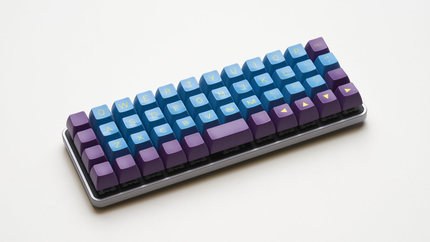 Equals 48 build with light and purple keycaps, viewed at angle